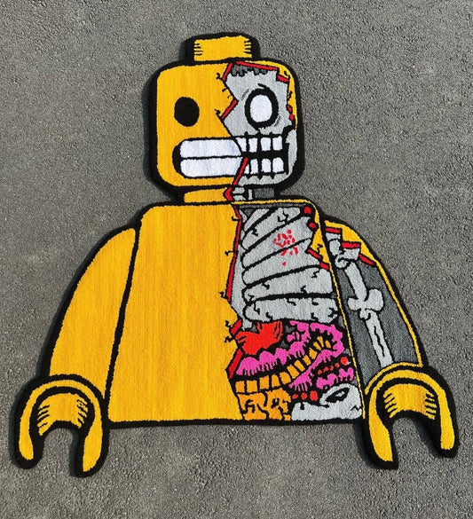 Anatomic Brick tufted rug displayed in a creative or pop culture-themed space — tapis tufting LEGO anatomique dans un espace créatif ou inspiré de la pop culture