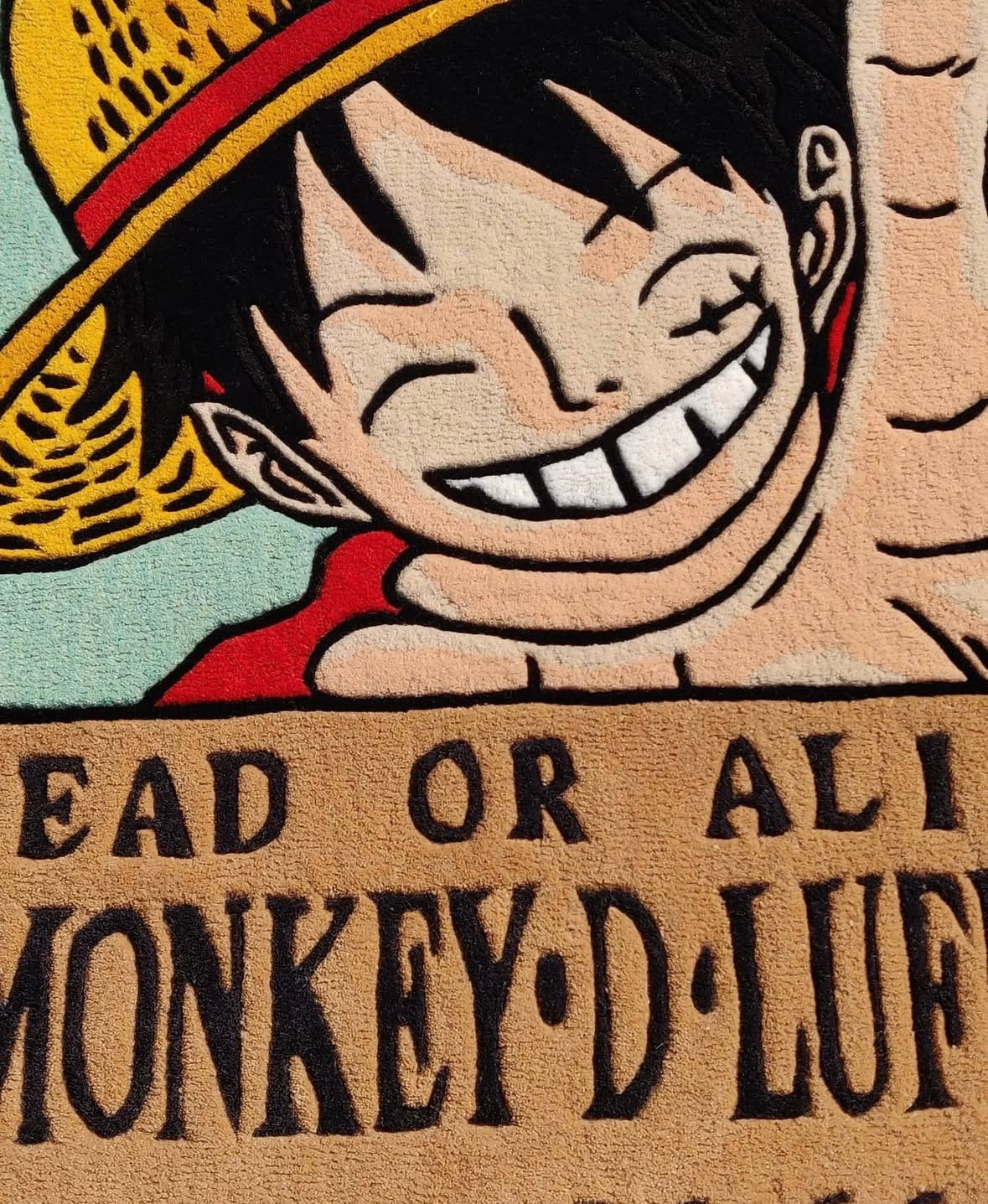 Close-up of tufted wool details on the Luffy Wanted rug zoom sur les détails en laine du tapis tufting Luffy avis de recherche