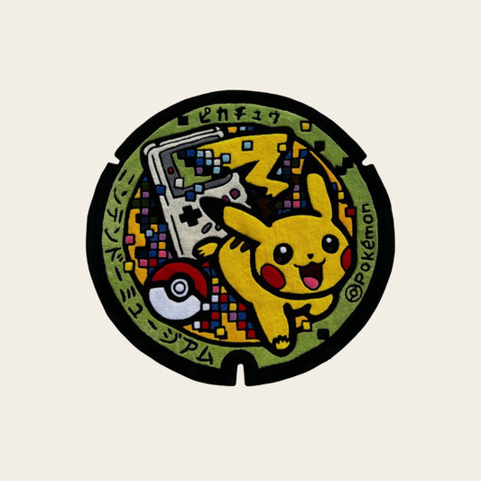 Tufted round rug featuring pixelated Pokémon characters  tapis tufting rond représentant des Pokémon en version pixelisée